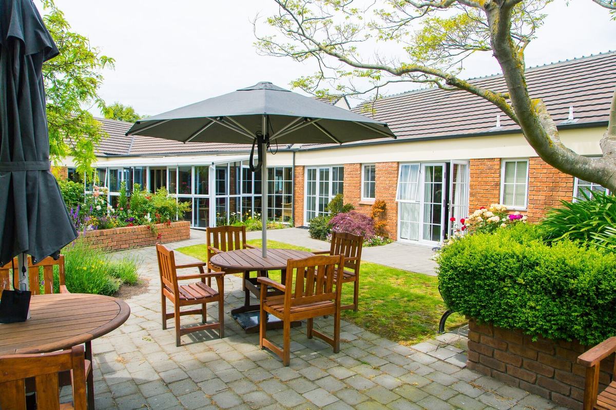 Tables and umbrellas in the courtyard